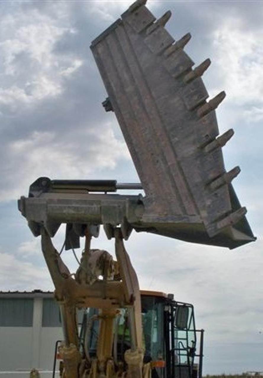 godet déversement latéral